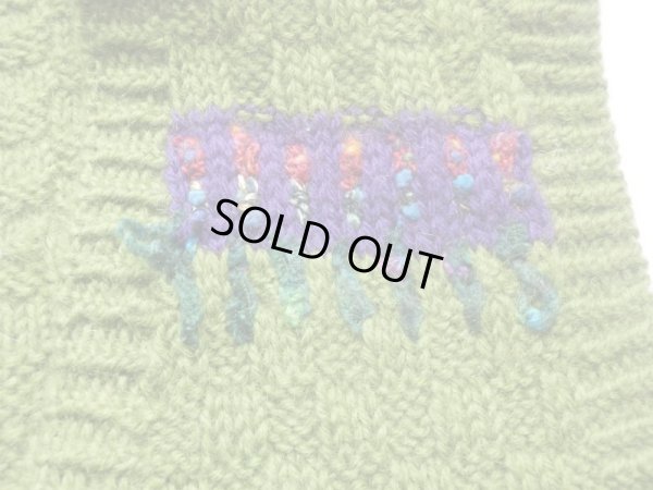 毛糸の飛び出しあり