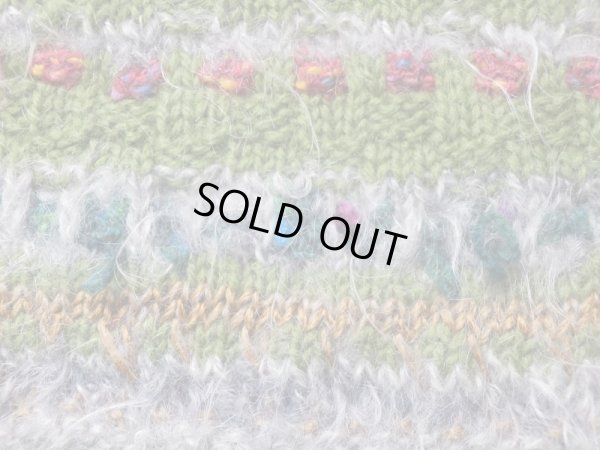 毛糸の飛び出しあり