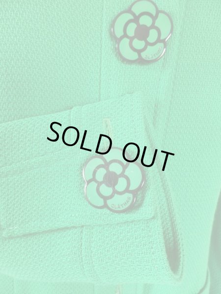 袖口ボタンに少々傷あり