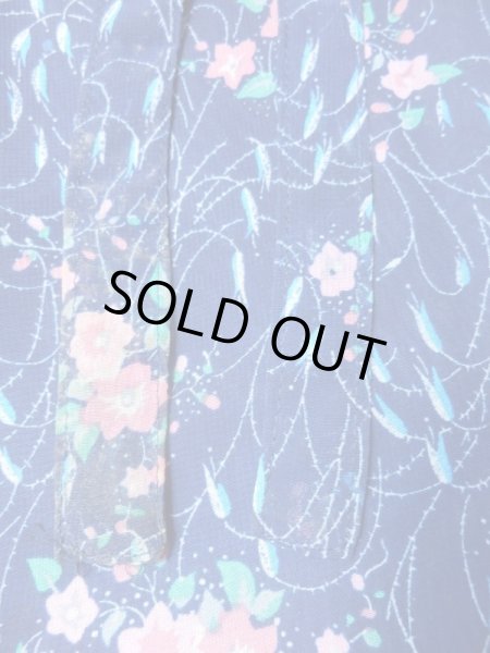 リボン紐端に汚れあり